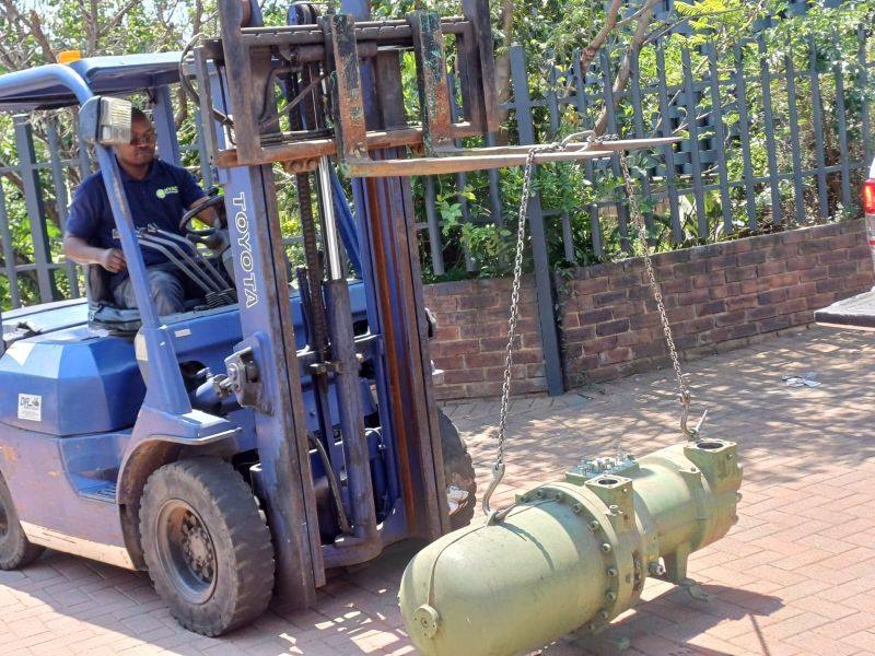 Compressor unit being transported by forklift
